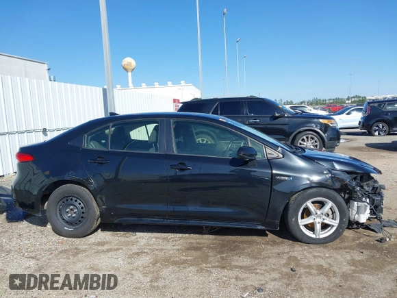 2021 Toyota Corolla Hybrid LE with VIN JTDEAMDE8MJ034218, listed as a IAAI auction lot 41692711 with 65,651 mi miles. Bid and sale history available at carsss.com. Image 14.