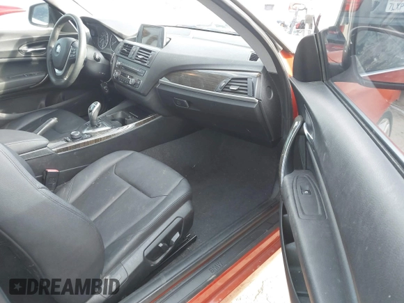 2015 BMW 2 Series 228i with VIN WBA1F9C56FVW98461, listed as a IAAI auction lot 41663193 with 94,584 mi miles. Bid and sale history available at carsss.com. Image 5.