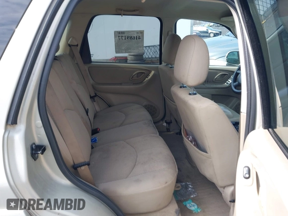 2006 Mazda Tribute S with VIN 4F2YZ04136KM15337, listed as a IAAI auction lot 41689177 with 153,720 mi miles and . Bid and sale history available at DreamBid. Image 8.