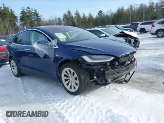 2019 Tesla Model X 75D with VIN 5YJXCAE22KF184383, listed as a IAAI auction lot 41527578 with 99,287 mi miles. Bid and sale history available at carsss.com. Image 1.