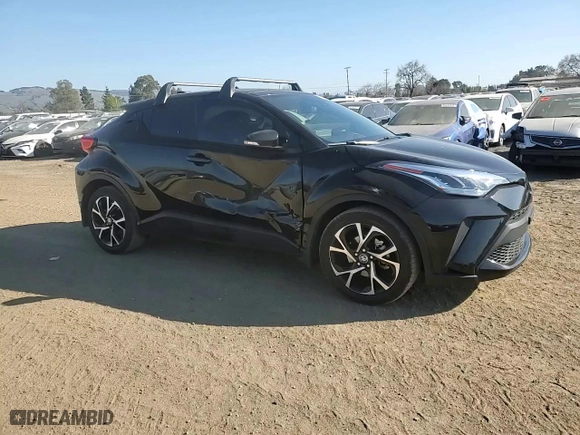 2022 Toyota C-HR XLE with VIN NMTKHMBX1NR142797, listed as a Copart auction lot 43277165 with 18,360 mi miles and Salvage Title. Bid and sale history available at carsss.com. Image 12.