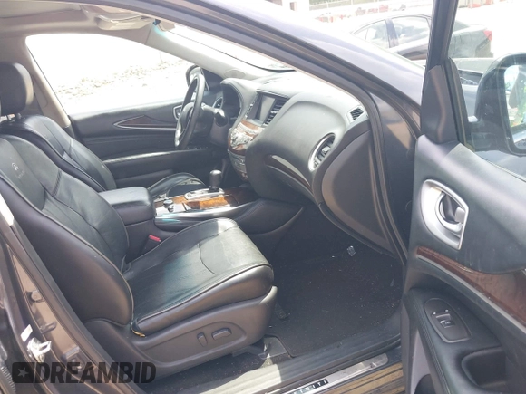 2013 Infiniti JX35 with VIN 5N1AL0MM7DC338388, listed as a IAAI auction lot 42122454 with 184,715 mi miles. Bid and sale history available at carsss.com. Image 5.