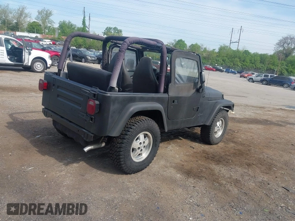 1999 Jeep Wrangler SE with VIN 1J4FY29P3XP469786, listed as a IAAI auction lot 42131018 with 130,918 mi miles and . Bid and sale history available at DreamBid. Image 4.