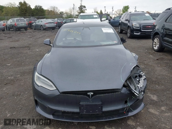 2021 Tesla Model S Long Range with VIN 5YJSA1E5XMF428519, listed as a IAAI auction lot 41926242 with 54,284 mi miles and . Bid and sale history available at DreamBid. Image 12.