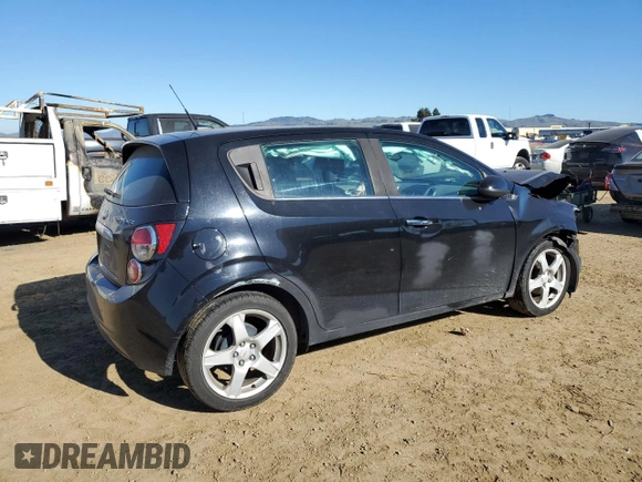 2012 Chevrolet Sonic LTZ z VIN 1G1JE6SH5C4195594, wystawiony jako Copart lot #88336435 z przebiegiem 105 112 mil mil oraz Szkoda całkowita • Salvage title. Historia ofert i sprzedaży dostępna na DreamBid. Obrazek 3.