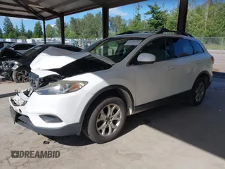 2013 Mazda CX-9 Touring with VIN JM3TB3CV7D0404510, listed as a IAAI auction lot 42385230 with 182,233 mi miles and . Bid and sale history available at DreamBid. Image 2.