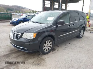 2014 Chrysler Town & Country Touring with VIN 2C4RC1BG4ER469409, listed as a IAAI auction lot 41919315 with 135,894 mi miles. Bid and sale history available at carsss.com. Image 2.