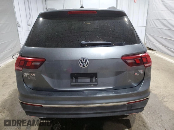 2018 Volkswagen Tiguan SEL z VIN 3VV2B7AX7JM002724, wystawiony jako Copart lot #57390965 z przebiegiem 103 661 mil mil oraz Szkoda całkowita • Salvage title. Historia ofert i sprzedaży dostępna na DreamBid. Obrazek 6.