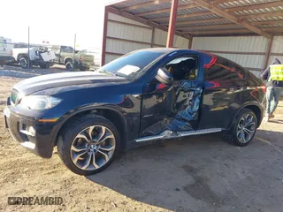 2014 BMW X6 xDrive35i with VIN 5UXFG2C59E0H11200, listed as a IAAI auction lot 41151158 with 140,478 mi miles. Bid and sale history available at carsss.com. Image 14.