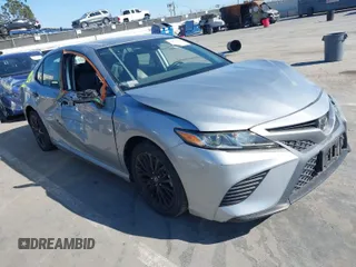 2019 Toyota Camry LE z VIN 4T1B11HKXKU259233, wystawiony jako IAAI lot #41870621 z przebiegiem 31 425 mil mil oraz . Historia ofert i sprzedaży dostępna na DreamBid. Obrazek 1.