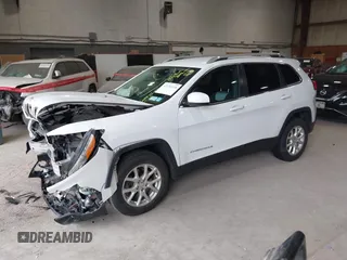 2014 Jeep Cherokee Altitude with VIN 1C4PJMCB7EW186432, listed as a IAAI auction lot 42076018 with 150,186 mi miles and . Bid and sale history available at DreamBid. Image 17.