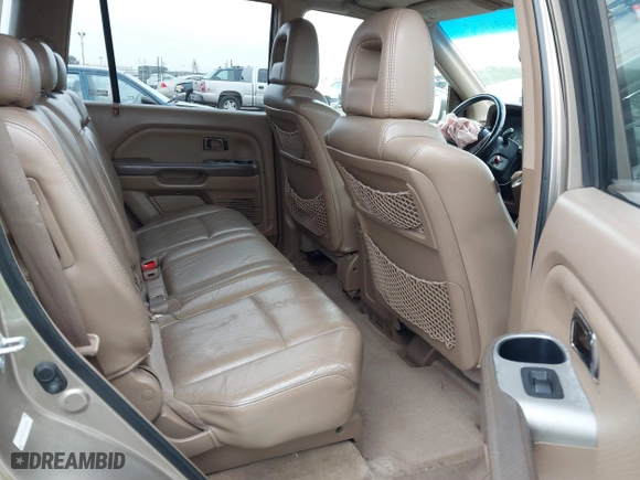 2005 Honda Pilot EX-L with NAVI with VIN 2HKYF18775H543185, listed as a IAAI auction lot 41597576 with 163,377 mi miles. Bid and sale history available at carsss.com. Image 8.