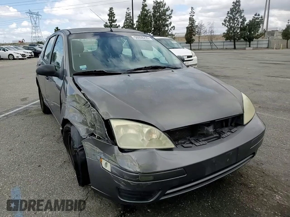 2006 Ford Focus S z VIN 1FAFP37N76W182882, wystawiony jako Copart lot #56939295 z przebiegiem 136 831 mil mil oraz Szkoda całkowita • Salvage title. Historia ofert i sprzedaży dostępna na DreamBid. Obrazek 13.