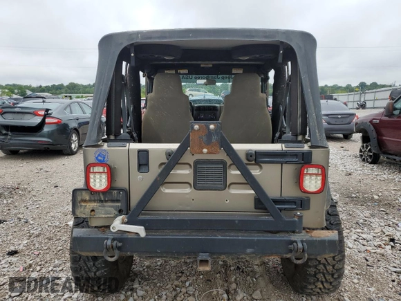 2004 Jeep Wrangler Rubicon with VIN 1J4FA69S94P774219, listed as a Copart auction lot 62806594 with 121,819 mi miles and Salvage Title. Bid and sale history available at carsss.com. Image 6.