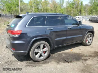 2014 Jeep Grand Cherokee Overland with VIN 1C4RJFCT1EC379867, listed as a Copart auction lot 54106375 with 217,908 mi miles and Clean Title. Bid and sale history available at carsss.com. Image 3.
