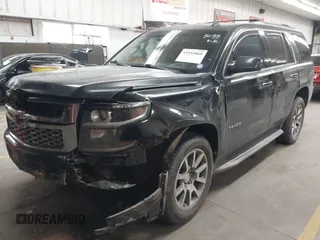 2015 Chevrolet Tahoe LT z VIN 1GNSCBKC1FR228488, wystawiony jako IAAI lot #41933869 z przebiegiem 164 523 mil mil oraz . Historia ofert i sprzedaży dostępna na DreamBid. Obrazek 18.