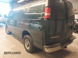 2004 GMC Savana Cargo Van with VIN 1GTHG35U041118061, listed as a IAAI auction lot 41296799 with 185,939 mi miles. Bid and sale history available at carsss.com. Image 3.