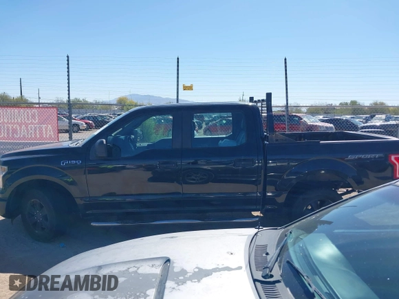 2015 Ford F-150 XLT with VIN 1FTEW1C89FKE65742, listed as a IAAI auction lot 42117957 with 153,413 mi miles and . Bid and sale history available at carsss.com. Image 14.