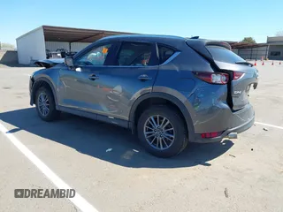 2019 Mazda CX-5 Touring with VIN JM3KFACM1K0533142, listed as a IAAI auction lot 41880181 with Not Provided miles and . Bid and sale history available at carsss.com. Image 3.