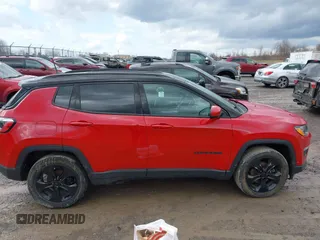 2021 Jeep Compass Altitude with VIN 3C4NJDBB3MT504477, listed as a IAAI auction lot 41886527 with 50,341 mi miles and . Bid and sale history available at DreamBid. Image 13.
