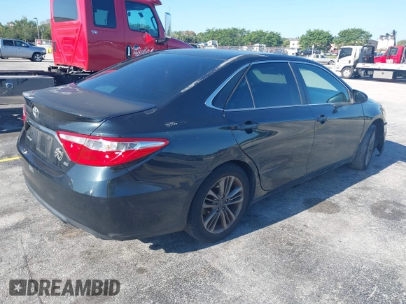 2015 Toyota Camry XLE with VIN 4T1BF1FK6FU986878, listed as a IAAI auction lot 42043397 with 119,349 mi miles. Bid and sale history available at carsss.com. Image 4.