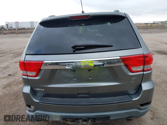 2013 Jeep Grand Cherokee Laredo with VIN 1C4RJEAG2DC571569, listed as a IAAI auction lot 41100518 with 98,265 mi miles. Bid and sale history available at carsss.com. Image 16.