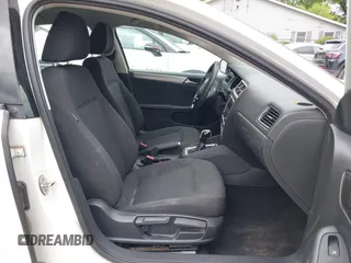 2015 Volkswagen Jetta SE z VIN 3VWD17AJ8FM323116, wystawiony jako IAAI lot #42246679 z przebiegiem 175 446 mil mil oraz . Historia ofert i sprzedaży dostępna na DreamBid. Obrazek 5.