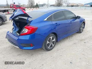 2020 Honda Civic LX with VIN 2HGFC2F69LH550744, listed as a IAAI auction lot 42079594 with 34,724 mi miles and . Bid and sale history available at DreamBid. Image 4.