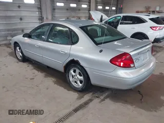 2003 Ford Taurus SES Standard with VIN 1FAFP55U13G222465, listed as a IAAI auction lot 42168336 with 128,078 mi miles. Bid and sale history available at carsss.com. Image 3.