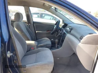 2005 Toyota Corolla CE with VIN 1NXBR32E85Z461242, listed as a IAAI auction lot 42224432 with 263,490 mi miles and . Bid and sale history available at DreamBid. Image 5.
