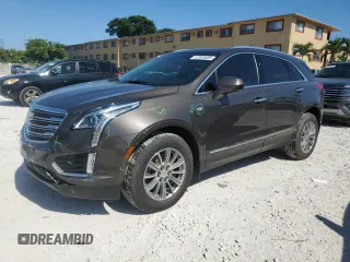 2019 Cadillac XT5 Luxury FWD z VIN 1GYKNCRS7KZ221202, wystawiony jako Copart lot #57554605 z przebiegiem 60 229 mil mil oraz Szkoda całkowita • Salvage title. Historia ofert i sprzedaży dostępna na DreamBid. Obrazek 1.