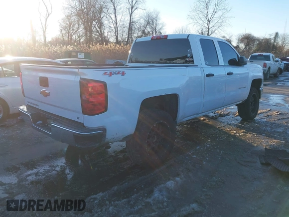 2014 Chevrolet Silverado 1500 LT with VIN 1GCVKREH4EZ148979, listed as a IAAI auction lot 41215714 with 193,710 mi miles and . Bid and sale history available at DreamBid. Image 4.