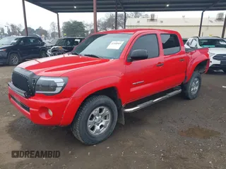2008 Toyota Tacoma PreRunner with VIN 3TMJU62N98M059769, listed as a IAAI auction lot 41368969 with 213,604 mi miles. Bid and sale history available at carsss.com. Image 2.