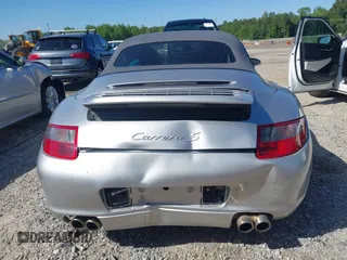 2006 Porsche 911 Carrera S z VIN WP0CB29976S766616, wystawiony jako IAAI lot #42119525 z przebiegiem 57 164 mil mil oraz . Historia ofert i sprzedaży dostępna na DreamBid. Obrazek 16.