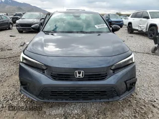 2024 Honda Civic Sport with VIN 2HGFE2F53RH592613, listed as a Copart auction lot 56556885 with 10,849 mi miles and Salvage title. Bid and sale history available at DreamBid. Image 5.