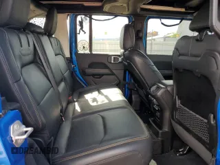 2024 Jeep Wrangler Sahara with VIN 1C4RJXP60RW163829, listed as a Copart auction lot 57182365 with 16,873 mi miles and Salvage title. Bid and sale history available at DreamBid. Image 11.
