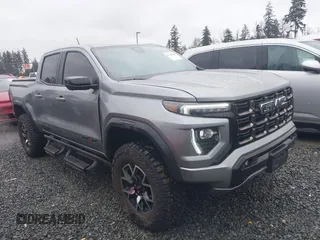 2024 GMC Canyon 4WD AT4X with VIN 1GTP6EEK9R1163595, listed as a IAAI auction lot 41568532 with 5,742 mi miles. Bid and sale history available at carsss.com. Image 1.