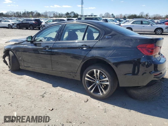 2018 BMW 3 Series 330e iPerformance with VIN WBA8E1C57JA762624, listed as a Copart auction lot 50692415 with 36,744 mi miles and Salvage Title. Bid and sale history available at carsss.com. Image 2.