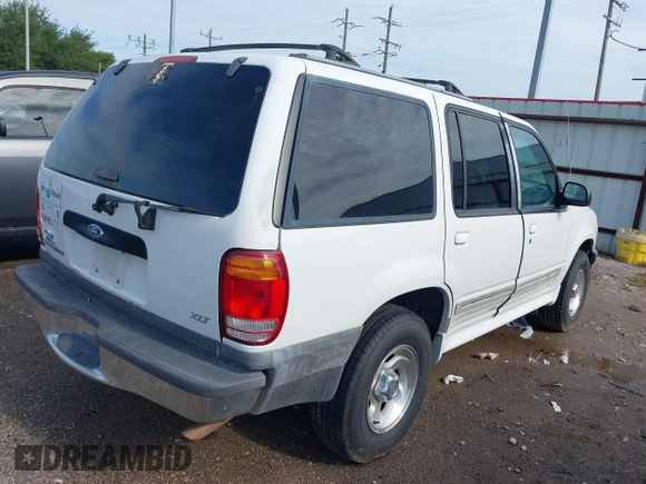 1999 Ford Explorer XLT z VIN 1FMZU32E9XZB70428, wystawiony jako IAAI lot #42697066 z przebiegiem 183 745 mil mil oraz . Historia ofert i sprzedaży dostępna na DreamBid. Obrazek 4.