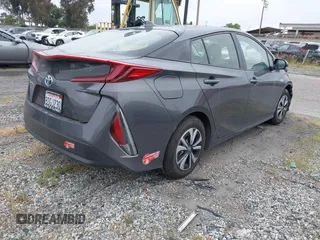 2017 Toyota Prius Plus with VIN JTDKARFP7H3054775, listed as a IAAI auction lot 42023670 with 80,759 mi miles and . Bid and sale history available at DreamBid. Image 4.