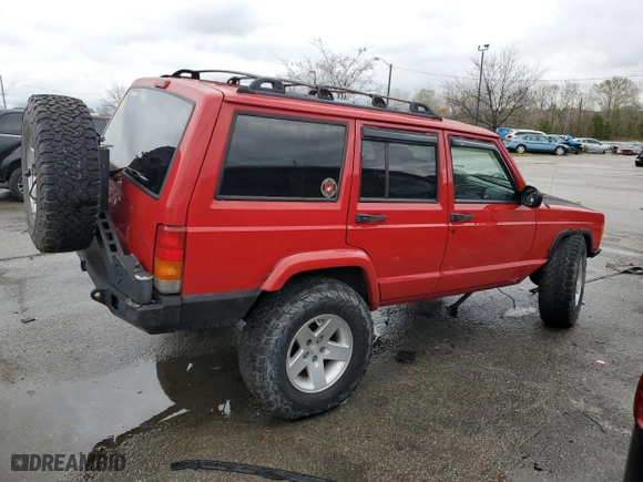 2001 Jeep Cherokee Sport with VIN 1J4FF48S61L568043, listed as a Copart auction lot 80671554 with 244,660 mi miles and Salvage Title. Bid and sale history available at carsss.com. Image 3.