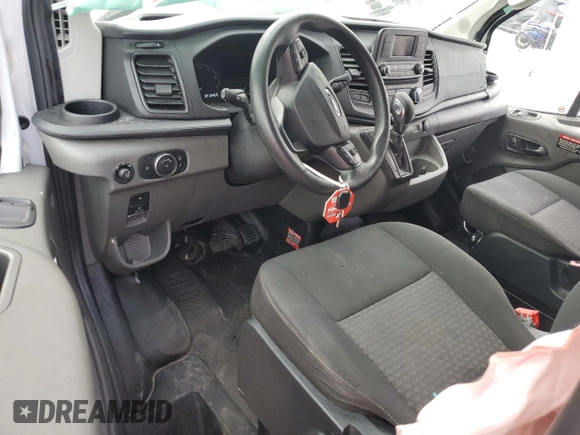 2023 Ford Transit Cargo with VIN 1FTBR1Y82PKB56604, listed as a Copart auction lot 50419485 with 24,546 mi miles and Clean Title. Bid and sale history available at DreamBid. Image 8.