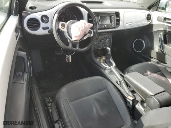 2012 Volkswagen Beetle 2.5L PZEV with VIN 3VWJP7AT1CM630089, listed as a Copart auction lot 82707554 with 79,617 mi miles and Salvage Title. Bid and sale history available at carsss.com. Image 8.