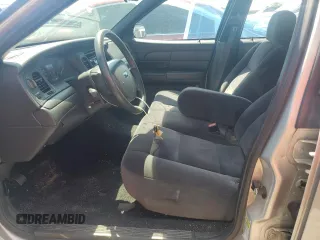 2006 Ford Police Interceptor z VIN 2FAFP71W96X163568, wystawiony jako Copart lot #62368215 z przebiegiem 116 536 mil mil oraz Szkoda całkowita • Salvage title. Historia ofert i sprzedaży dostępna na DreamBid. Obrazek 7.