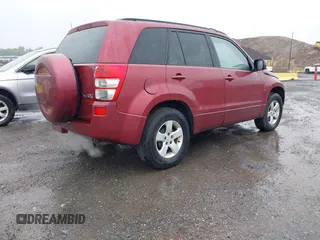2006 Suzuki Grand Vitara Premium z VIN JS3TD943864103101, wystawiony jako IAAI lot #42322528 z przebiegiem 184 503 mil mil oraz . Historia ofert i sprzedaży dostępna na DreamBid. Obrazek 4.