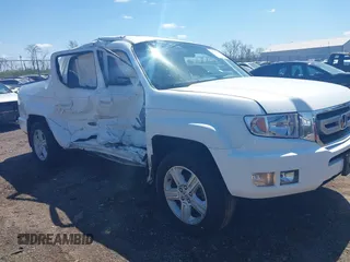 2009 Honda Ridgeline RTL with VIN 5FPYK16529B107871, listed as a IAAI auction lot 42049833 with 141,214 mi miles. Bid and sale history available at carsss.com. Image 1.