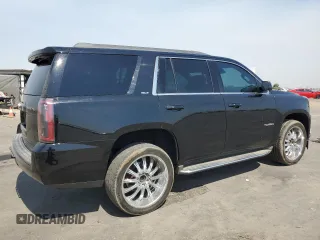 2016 GMC Yukon SLT with VIN 1GKS1BKCXGR122111, listed as a Copart auction lot 69900124 with 73,781 mi miles and Salvage Title. Bid and sale history available at carsss.com. Image 3.