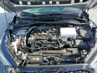 2023 Toyota Corolla Cross LE z VIN 7MUBAABG0PV074344, wystawiony jako Copart lot #70101104 z przebiegiem 9 577 mil mil oraz Szkoda całkowita • Salvage title. Historia ofert i sprzedaży dostępna na DreamBid. Obrazek 11.