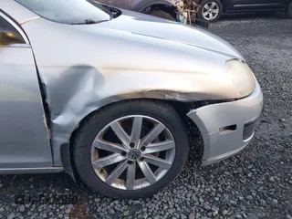 2007 Volkswagen Jetta 2.5 z VIN 3VWRG71K37M029136, wystawiony jako IAAI lot #41291108 z przebiegiem 219 980 mil mil oraz . Historia ofert i sprzedaży dostępna na DreamBid. Obrazek 6.