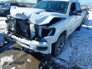 2021 Ram 1500 Limited with VIN 1C6SRFHT5MN548477, listed as a IAAI auction lot 41644894 with 51,429 mi miles and . Bid and sale history available at DreamBid. Image 2.